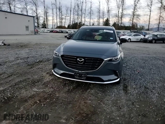 2021 Mazda CX-9 Carbon Edition с VIN JM3TCBDY1M0538672, выставлен на аукционе Copart как лот 80048854 с пробегом 53 979 миль миль и Списание • Salvage title. История ставок и продаж доступна на DreamBid. Изображение 11.