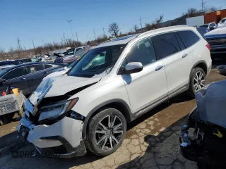 2020 Honda Pilot Touring 7-Passenger z VIN 5FNYF6H6XLB047801, wystawiony jako Copart lot #46220375 z przebiegiem 96 764 mil mil oraz Szkoda całkowita • Salvage title. Historia ofert i sprzedaży dostępna na DreamBid. Obrazek 1.