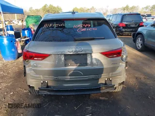 2021 Audi Q3 Premium with VIN WA1AUCF34M1099668, listed as a IAAI auction lot 41990226 with 69,866 mi miles and . Bid and sale history available at DreamBid. Image 16.