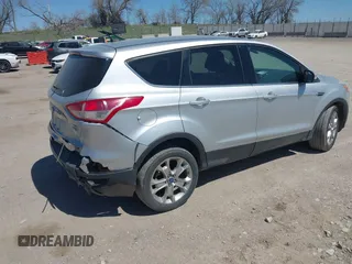 2013 Ford Escape SEL with VIN 1FMCU9H91DUA14749, listed as a IAAI auction lot 42039685 with 186,669 mi miles. Bid and sale history available at carsss.com. Image 4.