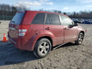 2012 Suzuki Grand Vitara Premium z VIN JS3TD0D65C4100898, wystawiony jako Copart lot #87241744 z przebiegiem Nie podano mil oraz Szkoda całkowita • Salvage title. Historia ofert i sprzedaży dostępna na DreamBid. Obrazek 3.