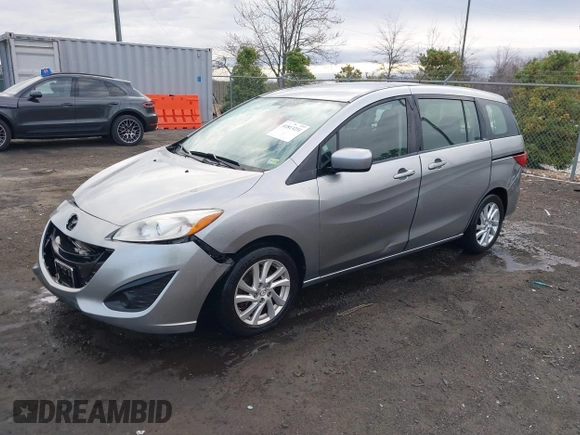 2012 Mazda 5 Sport with VIN JM1CW2BLXC0107933, listed as a IAAI auction lot 41813231 with 164,395 mi miles and . Bid and sale history available at DreamBid. Image 18.