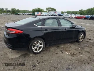 2018 Ford Fusion SE with VIN 3FA6P0H7XJR117390, listed as a Copart auction lot 58479935 with 155,043 mi miles and Clean title. Bid and sale history available at DreamBid. Image 3.