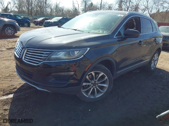 2015 Lincoln MKC with VIN 5LMCJ2A93FUJ42565, listed as a IAAI auction lot 41760265 with 82,812 mi miles. Bid and sale history available at carsss.com. Image 2.