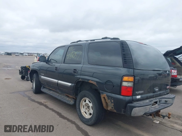 2004 GMC Yukon SLT with VIN 1GKEK13Z24J113954, listed as a IAAI auction lot 41950157 with 174,021 mi miles. Bid and sale history available at carsss.com. Image 3.