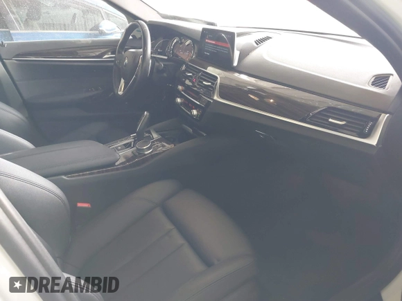2018 BMW 5 Series 530e with VIN WBAJA9C57JB034128, listed as a IAAI auction lot 41800329 with 66,684 mi miles and . Bid and sale history available at DreamBid. Image 5.