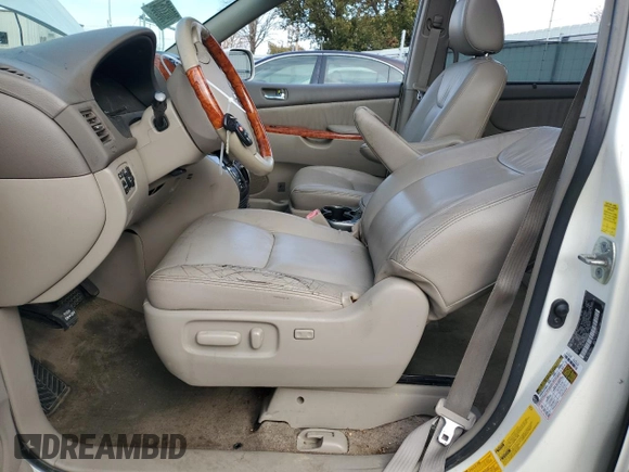 2010 Toyota Sienna XLE z VIN 5TDDK4CC8AS033402, wystawiony jako Copart lot #79083354 z przebiegiem 226 956 mil mil oraz Szkoda całkowita • Salvage title. Historia ofert i sprzedaży dostępna na DreamBid. Obrazek 7.