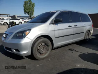 2010 Honda Odyssey LX with VIN 5FNRL3H23AB089233, listed as a Copart auction lot 62547695 with 163,209 mi miles and Salvage title. Bid and sale history available at DreamBid. Image 1.