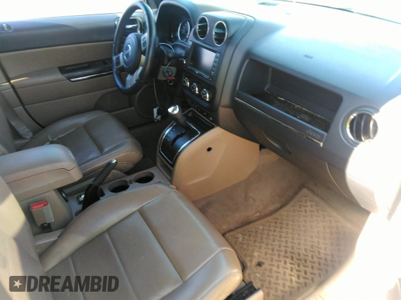 2011 Jeep Compass Limited with VIN 1J4NF5FB7BD281746, listed as a IAAI auction lot 41758467 with 145,131 mi miles. Bid and sale history available at carsss.com. Image 5.