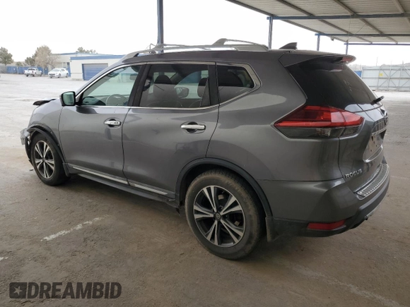 2017 Nissan Rogue SV with VIN 5N1AT2MT2HC871757, listed as a Copart auction lot 50798155 with 103,458 mi miles and Salvage Title. Bid and sale history available at carsss.com. Image 2.