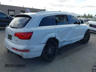 2015 Audi Q7 Premium Plus z VIN WA1LGAFE6FD028835, wystawiony jako IAAI lot #42358725 z przebiegiem 107 075 mil mil oraz . Historia ofert i sprzedaży dostępna na DreamBid. Obrazek 4.
