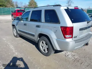 2005 Jeep Grand Cherokee Laredo with VIN 1J4HR48N65C537469, listed as a IAAI auction lot 41676555 with 226,084 mi miles. Bid and sale history available at carsss.com. Image 3.