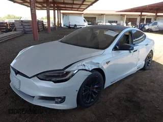 2016 Tesla Model S 90D with VIN 5YJSA1E22GF149639, listed as a IAAI auction lot 42583167 with Not provided miles and . Bid and sale history available at DreamBid. Image 6.