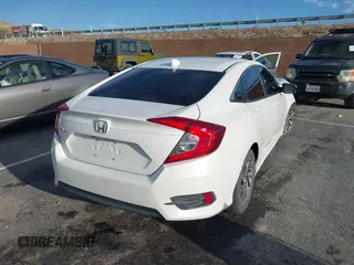 2017 Honda Civic EX z VIN 2HGFC2F76HH573639, wystawiony jako IAAI lot #41807311 z przebiegiem 140 431 mil mil oraz . Historia ofert i sprzedaży dostępna na DreamBid. Obrazek 4.