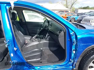 2013 Mazda CX-5 Grand Touring with VIN JM3KE4DE4D0123837, listed as a IAAI auction lot 42031074 with 121,818 mi miles. Bid and sale history available at carsss.com. Image 5.