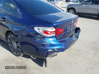 2019 BMW 5 Series 540i with VIN WBAJE5C56KG919325, listed as a IAAI auction lot 41712632 with 71,413 mi miles and . Bid and sale history available at DreamBid. Image 18.