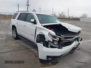 2017 Chevrolet Tahoe LT z VIN 1GNSCBKC8HR313749, wystawiony jako IAAI lot #41230472 z przebiegiem 123 743 mil mil oraz . Historia ofert i sprzedaży dostępna na DreamBid. Obrazek 1.
