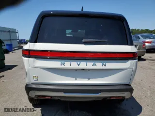 2024 Rivian R1S Adventure with VIN 7PDSGABA7RN040780, listed as a Copart auction lot 63705184 with 1,053 mi miles and Salvage Title. Bid and sale history available at carsss.com. Image 6.