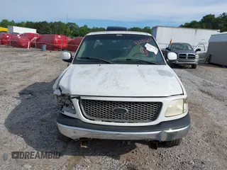2001 Ford F-150 XL z VIN 1FTRX17WX1NA20036, wystawiony jako IAAI lot #42231600 z przebiegiem 181 549 mil mil oraz . Historia ofert i sprzedaży dostępna na DreamBid. Obrazek 12.