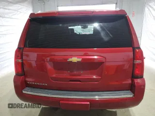 2015 Chevrolet Suburban LTZ with VIN 1GNSKKKC7FR299567, listed as a Copart auction lot 52944035 with 147,964 mi miles and Salvage Title. Bid and sale history available at DreamBid. Image 6.