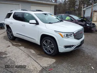 2018 GMC Acadia Denali with VIN 1GKKNXLS3JZ106525, listed as a IAAI auction lot 42012726 with 112,698 mi miles and . Bid and sale history available at carsss.com. Image 1.