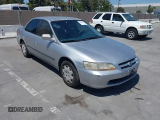 1999 Honda Accord LX with VIN JHMCG665XXC033464, listed as a IAAI auction lot 42687150 with 194,076 mi miles and . Bid and sale history available at DreamBid. Image 6.