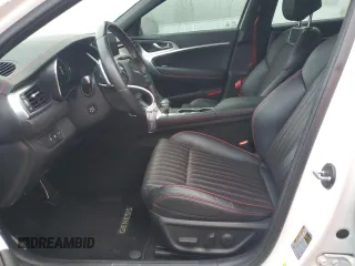 2023 Genesis G70 2.0T with VIN KMTG34TA4PU104576, listed as a Copart auction lot 85082044 with 28,821 mi miles and Salvage Title. Bid and sale history available at DreamBid. Image 7.