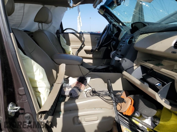 2015 Honda Pilot EX-L z VIN 5FNYF3H51FB004443, wystawiony jako Copart lot #56257005 z przebiegiem 163 829 mil mil oraz Szkoda całkowita • Salvage title. Historia ofert i sprzedaży dostępna na DreamBid. Obrazek 7.