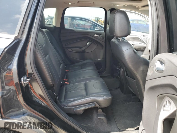 2013 Ford Escape Titanium z VIN 1FMCU0J98DUD37329, wystawiony jako Copart lot #50832495 z przebiegiem 94 386 mil mil oraz Szkoda całkowita • Salvage title. Historia ofert i sprzedaży dostępna na DreamBid. Obrazek 10.