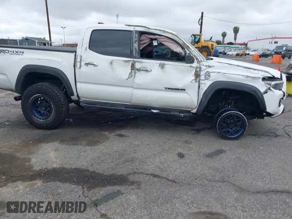 2023 Toyota Tacoma 4WD SR with VIN 3TMCZ5AN0PM550641, listed as a IAAI auction lot 41929355 with 18,917 mi miles. Bid and sale history available at carsss.com. Image 13.