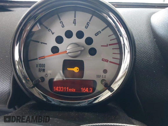 2013 MINI Countryman S with VIN WMWZC3C56DWP24170, listed as a IAAI auction lot 42366594 with 143,311 mi miles and . Bid and sale history available at DreamBid. Image 16.