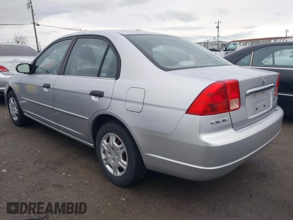 2001 Honda Civic LX with VIN 2HGES15561H561957, listed as a IAAI auction lot 41487631 with 214,529 mi miles. Bid and sale history available at carsss.com. Image 3.