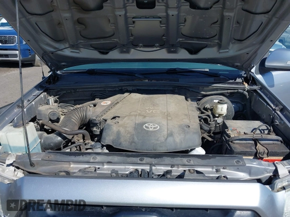 2014 Toyota Tacoma with VIN 3TMLU4EN7EM146705, listed as a IAAI auction lot 41949827 with 147,887 mi miles and . Bid and sale history available at DreamBid. Image 10.
