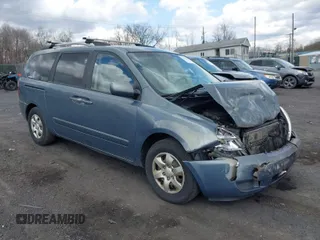 2009 Kia Sedona LX with VIN KNDMB233696299758, listed as a IAAI auction lot 41929906 with 214,445 mi miles. Bid and sale history available at carsss.com. Image 1.
