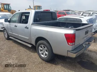 2013 Nissan Titan SV with VIN 1N6AA0EK2DN302357, listed as a IAAI auction lot 42161579 with 199,438 mi miles and . Bid and sale history available at DreamBid. Image 3.