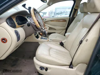 2004 Jaguar X-Type with VIN SAJEA51C84WD57149, listed as a Copart auction lot 82661344 with 146,574 mi miles and Salvage Title. Bid and sale history available at carsss.com. Image 7.