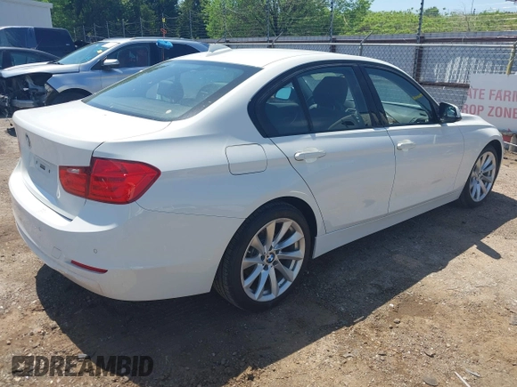 2015 BMW 3 Series 320i xDrive with VIN WBA3C3G50FNT51569, listed as a IAAI auction lot 42054171 with 74,305 mi miles and . Bid and sale history available at DreamBid. Image 4.