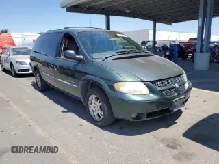 2001 Dodge Caravan Sport with VIN 2B8GP44G31R148820, listed as a Copart auction lot 64069494 with 70,125 mi miles and Salvage Title. Bid and sale history available at carsss.com. Image 4.