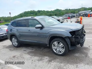 2019 Volkswagen Atlas SE z VIN 1V2WR2CAXKC611864, wystawiony jako IAAI lot #42151795 z przebiegiem 90 178 mil mil oraz . Historia ofert i sprzedaży dostępna na DreamBid. Obrazek 13.