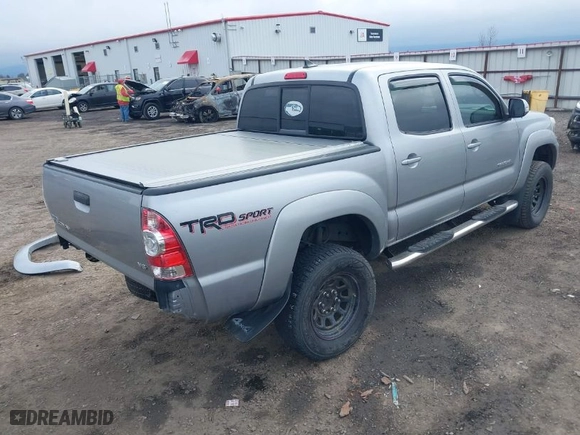 2015 Toyota Tacoma with VIN 3TMLU4EN7FM193847, listed as a IAAI auction lot 41702883 with NaN miles. Bid and sale history available at carsss.com. Image 4.
