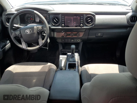 2022 Toyota Tacoma SR with VIN 3TYRX5GNXNT047479, listed as a Copart auction lot 57023765 with 84,802 mi miles and Salvage title. Bid and sale history available at DreamBid. Image 8.