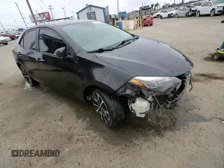 2019 Toyota Corolla L z VIN 2T1BURHE2KC130632, wystawiony jako Copart lot #53754325 z przebiegiem 244 272 mil mil oraz Szkoda całkowita • Salvage title. Historia ofert i sprzedaży dostępna na DreamBid. Obrazek 10.
