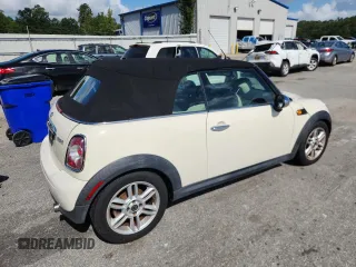 2011 MINI Convertible with VIN WMWZN3C59BTZ78433, listed as a Copart auction lot 65509575 with 102,800 mi miles and Clean title. Bid and sale history available at DreamBid. Image 3.