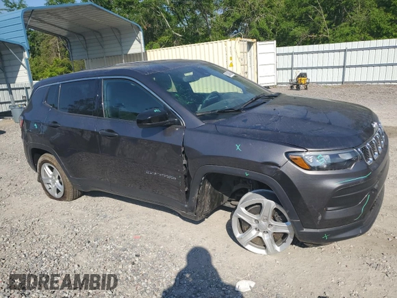 2023 Jeep Compass Sport with VIN 3C4NJDAN0PT572204, listed as a Copart auction lot 52490095 with 8,284 mi miles and Salvage title. Bid and sale history available at DreamBid. Image 4.