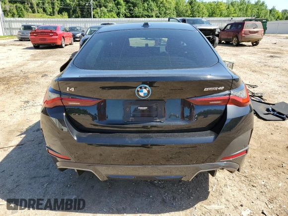 2022 BMW i4 eDrive40 with VIN WBY73AW05NFM59840, listed as a Copart auction lot 55608094 with 25,720 mi miles and Salvage Title. Bid and sale history available at carsss.com. Image 6.