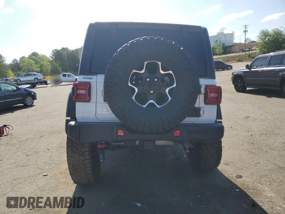 2020 Jeep Wrangler Unlimited Recon with VIN 1C4HJXFN2LW253771, listed as a Copart auction lot 54837675 with 98,935 mi miles and Salvage title. Bid and sale history available at DreamBid. Image 6.