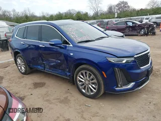 2023 Cadillac XT6 AWD Premium Luxury with VIN 1GYKPDRS2PZ126666, listed as a IAAI auction lot 40963833 with 23,535 mi miles and . Bid and sale history available at DreamBid. Image 14.