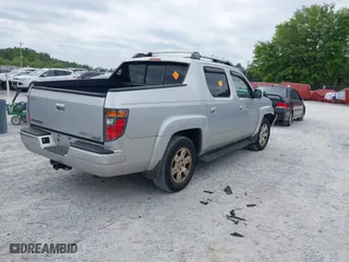 2008 Honda Ridgeline RTL with VIN 2HJYK16568H527114, listed as a IAAI auction lot 42042902 with 127,159 mi miles. Bid and sale history available at carsss.com. Image 4.