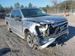 2021 Ford F-150 XL with VIN 1FTFW1E58MFA73753, listed as a IAAI auction lot 41707310 with 138,450 mi miles. Bid and sale history available at carsss.com. Image 6.