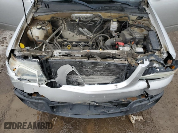 2011 Mazda Tribute Sport with VIN 4F2CY9C70BKM03826, listed as a Copart auction lot 45222665 with 171,082 mi miles and Salvage Title. Bid and sale history available at DreamBid. Image 12.